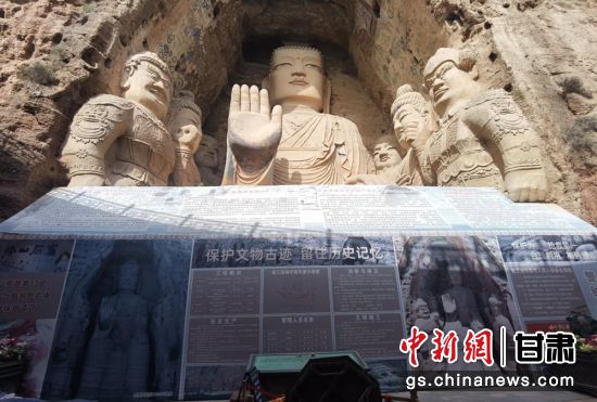 時下，中國“石窟鼻祖”天梯山石窟第13窟大佛足部與局部危巖體搶救性保護(hù)項(xiàng)目正在施工。圖為施工現(xiàn)場。陳曉斌 攝