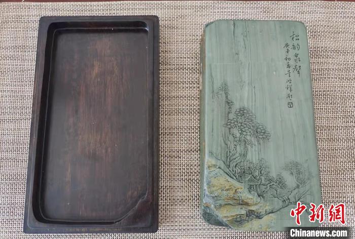 圖為盧保勝為提升洮硯文化內(nèi)涵，制作“一硯一銘、一盒一拓”成品展示?！堟?攝